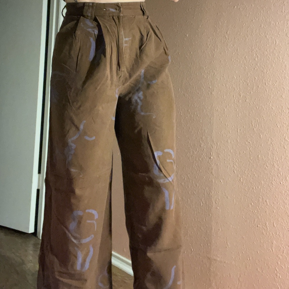 Paloma Wool Brown Pants with lavender kissing faces Pattern
